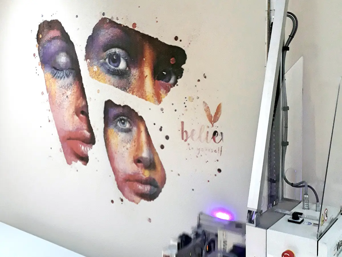 Believe in yourself printed on textured wall