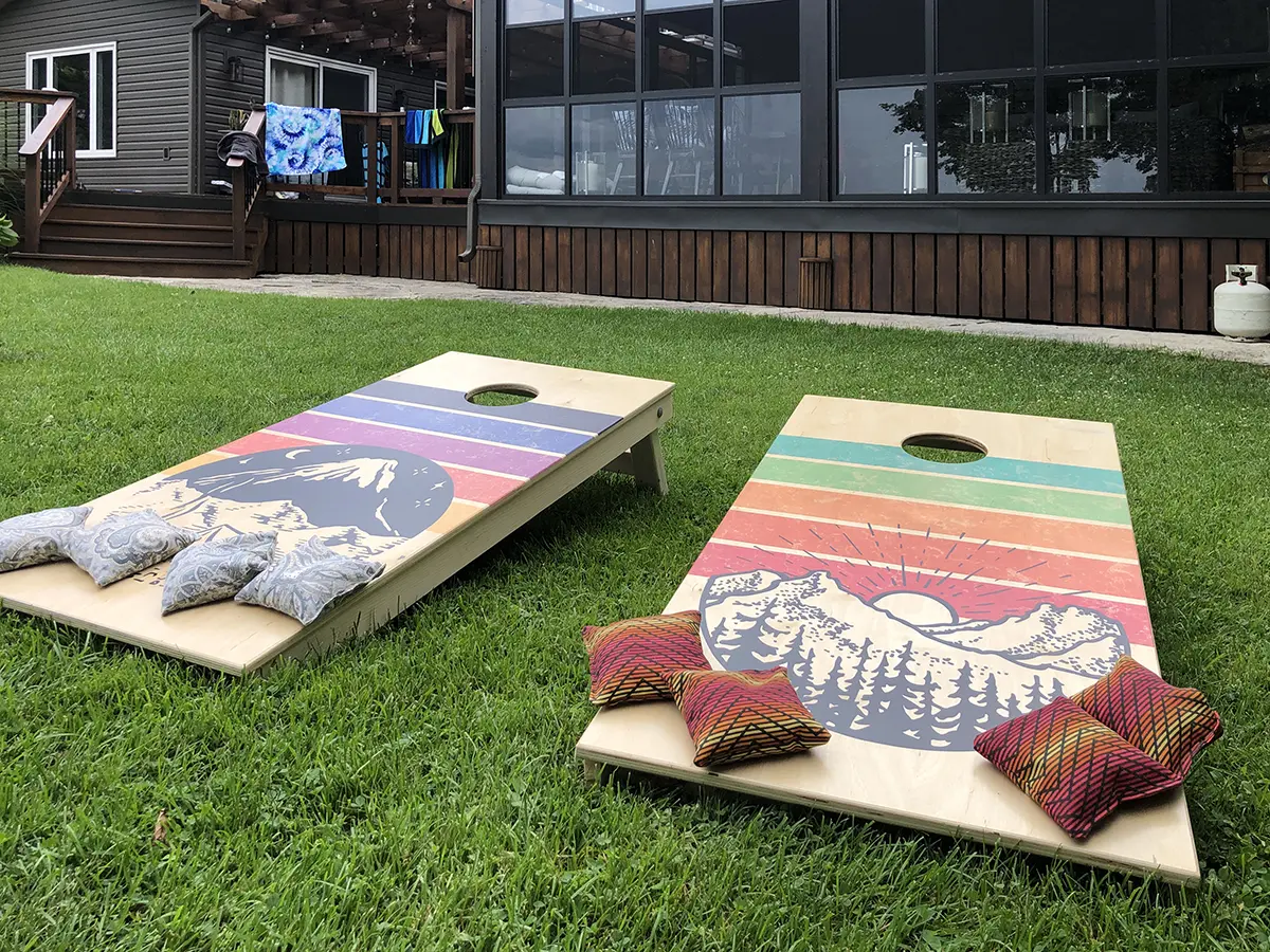 Mountain illustration on cornhole boards