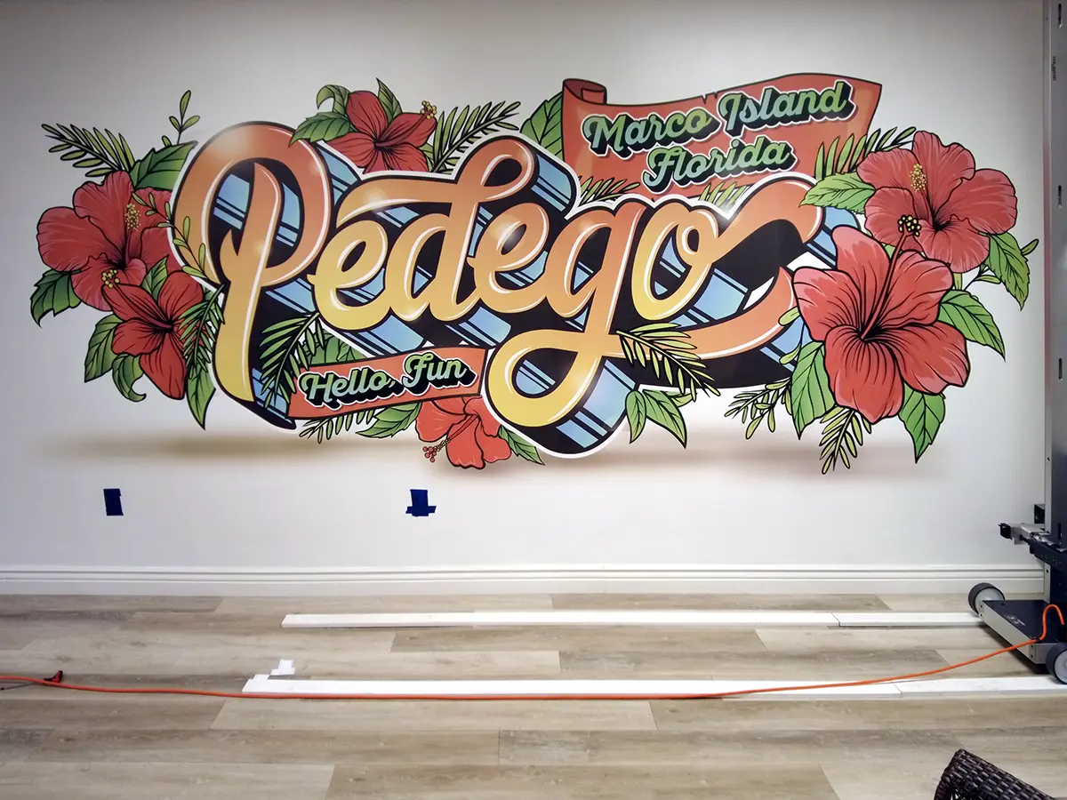 Pedego logo signage on wall