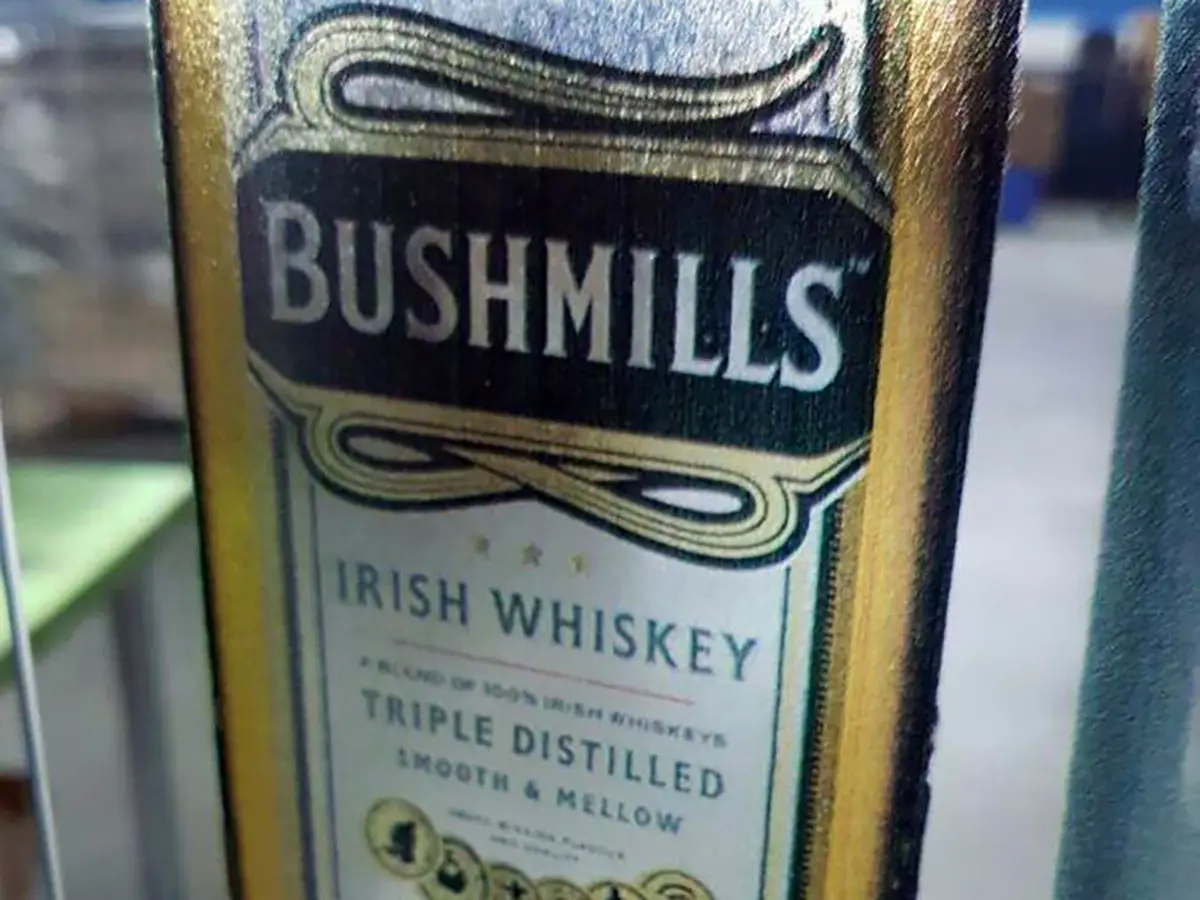 The image of bushmills bottle lable printed on glass