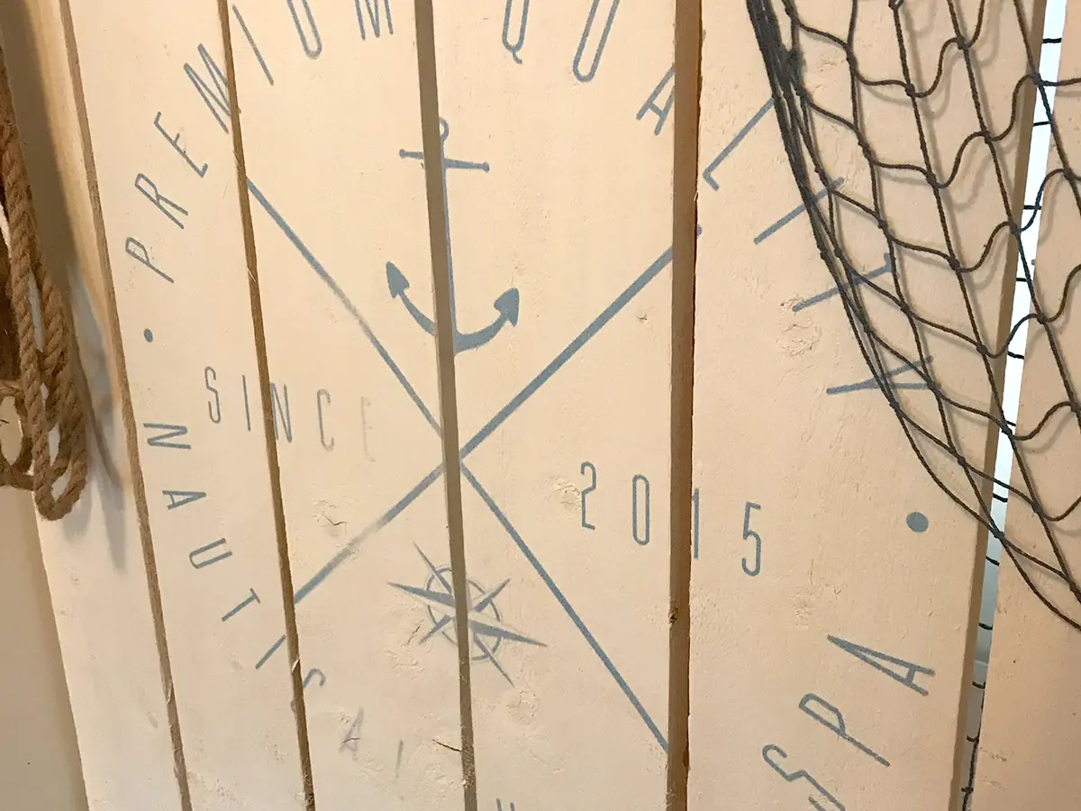 Round logo print on wood panels